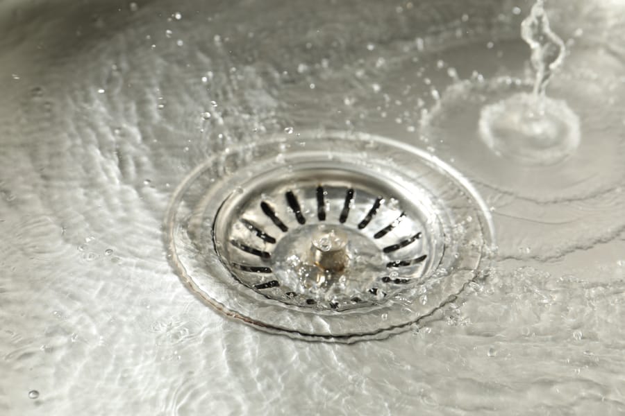 a clean drain effectively draining water from a metal sink